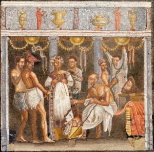 Roman banquet scene with people in traditional attire and decorative background.